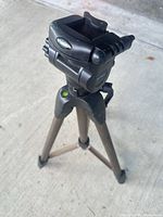 Overall view of Dynex tripod standing on concrete