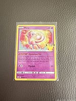 Front view of Pokémon Celebrations Mew holo card in sleeve