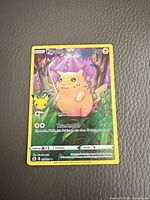 Front of Pikachu Celebrations Pokémon card showing artwork, HP, attacks and set details