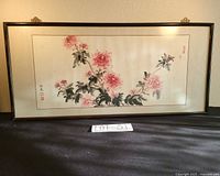 Full framed panel showing floral artwork and dark wood frame