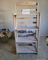 Front view of open four-shelf folding bookcase