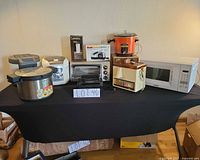 Assorted kitchen appliances on table