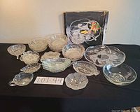 Full view of lot showing all glass pieces on table