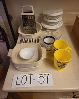 Full lot overview on countertop showing all items and lot number card