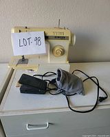 Singer Merritt sewing machine with foot pedal and cord
