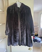 Full view of dark brown mink fur jacket front