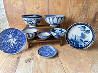 Group view showing all eight blue and white porcelain pieces