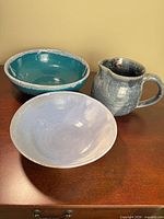 All three stoneware pieces on tabletop