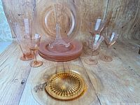 Group shot of all plates, stemware and stand