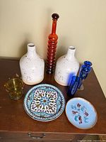 Full lot showing vases, plates, votive and tumbler