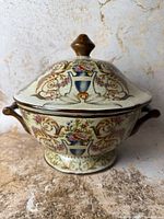 Front view of ceramic lidded bowl showing pattern and shape