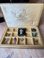 Open jewelry box showing all contents