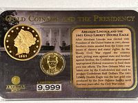 Front of card showing both coins and title