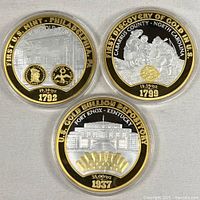 All three encapsulated tokens front side