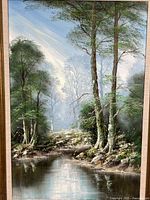 Close view of landscape print showing trees, water and color detail