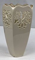 Front and side view of Lenox pierced heart panelled vase