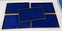 Five trays arranged, showing size and velvet interiors