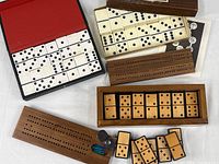All three domino sets and both cribbage boards displayed