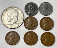 Group shot of all eight coins