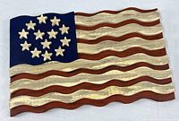Full view of wooden American flag showing overall design and condition