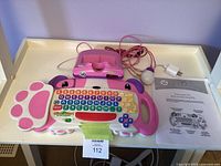 Keyboard, console, cables and adapter laid out