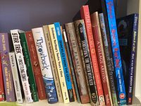 Shelf view showing Star Trek, animal reference, Throwback, Shackles From The Deep, Twelve Years a Slave and other hardcovers and paperbacks