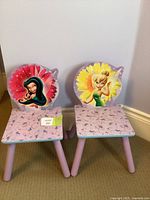 Front view of both chairs showing overall design and graphics