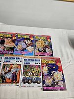 Group of 6 Dragon Ball Z Chinese comic books on table