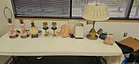 Full view of all lamp bases and accessories on table