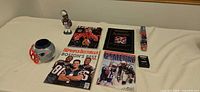 Full lot overview showing all eight Patriots items on table