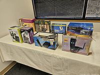 All nine boxed items on table