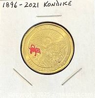 Reverse side of 2021 Klondike Gold Rush loonie in 2x2 holder