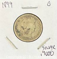 Obverse of 1899 Barber quarter in flip showing date and Liberty head