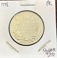 Reverse of 50-cent silver proof coin in holder