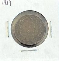Reverse of 1919 Canadian large cent showing date and CANADA within wreath, in 2x2 flip