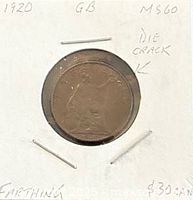 Reverse side showing Britannia and 1920 date with die crack notation in flip