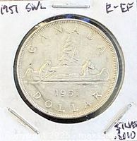 Reverse of 1951 Canadian silver dollar in cardboard holder
