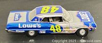 Left side view of 1964 Chevrolet Impala SS #48 Lowe’s diecast model