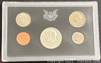 Obverse view of five-coin 1969 proof set in plastic holder