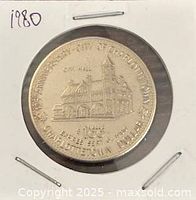 Obverse showing Charlottetown City Hall design in holder