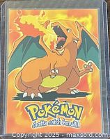 Front of 1999 Topps Pokémon Charizard Stage 3 card in sleeve
