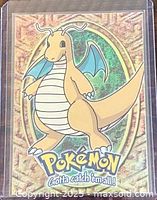 Front view of Topps Pokémon Dragonite #149 card in sleeve