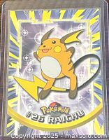 Front of 1999 Topps Pokémon Raichu #26 card in sleeve