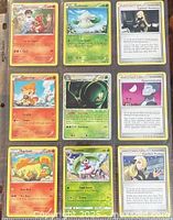 Nine front faces of the Pokémon cards in binder sleeve