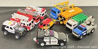 Group view of 10 assorted toy vehicles