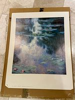 Front view of entire unframed Claude Monet print on cardboard backing