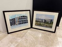 Both framed watercolour paintings side by side showing frames, mats and overall condition