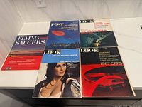 Front covers showing six magazines laid out