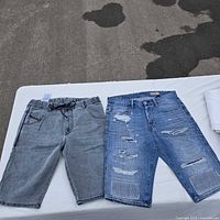 Front view of both pairs of shorts laid flat