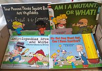 Front covers of all four FoxTrot books in box